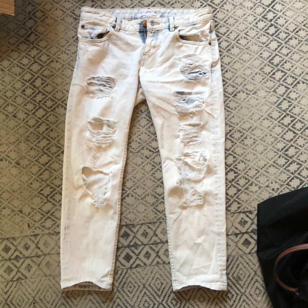 Light wash ripped boyfriend jeans